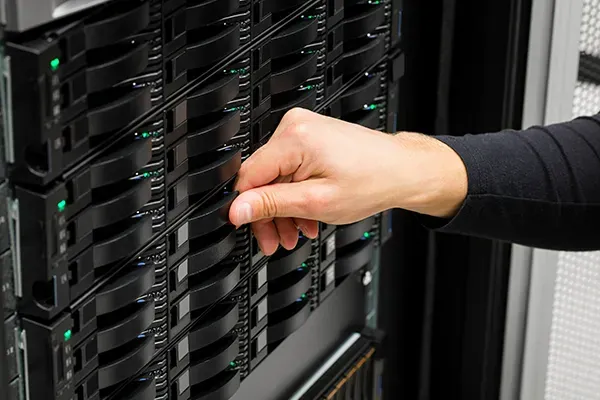 Man checking computer storage