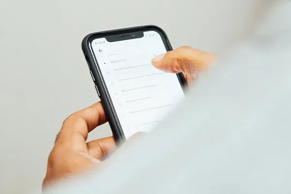 Man scrolling through phone